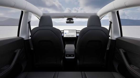 Model Y cabin looking rearward under the glass roof